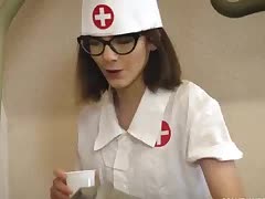 Hospital young nurse blows an old male patient